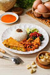 Nasi Padang Food - Fried Scrambled Eggs (Indonesian : Telur Dadar Padang) is a dish originating from West Sumatra