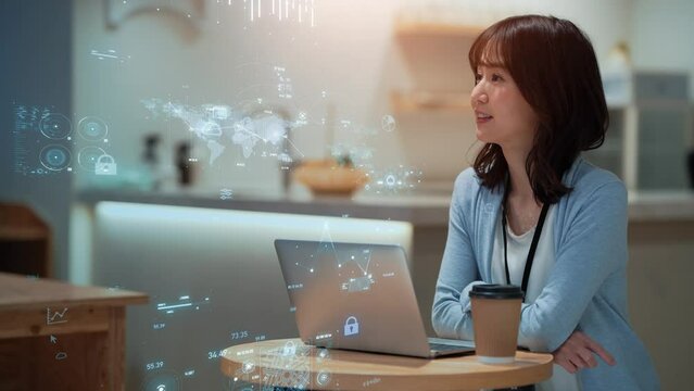 オフィスで会話する女性とデジタルデータ