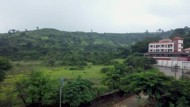Panorama Of Green Mountains And Residential Houses In Trimbak, India. - wide panning