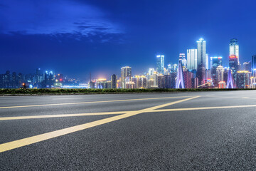 Obraz premium Empty road and city buildings background