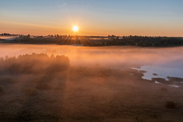 Foggy dawn in Izborsko-Malskaya valley, Pskov region