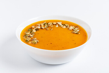 pumpkin cream soup on the white