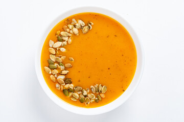 pumpkin cream soup on the white