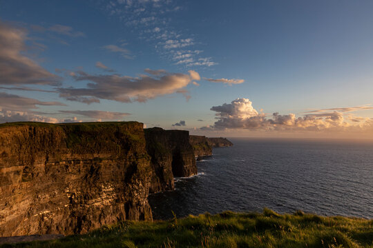 Cliffs of Moher by sea at sunset, Ireland