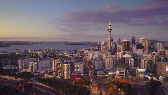Aerial: Auckland city and commuter traffic at twilight