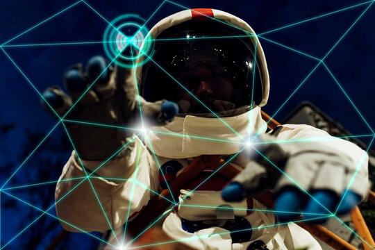 Astronaut touching transparent screen