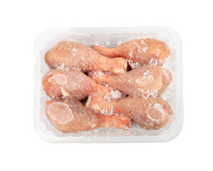 Raw Frozen Chicken Drumsticks in a Plastic Container Isolated