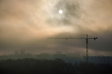 tower crane building sunset clouds sun city beautiful view