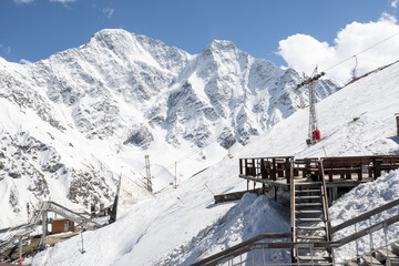 Cable car against the backdrop of the snow-capped Caucasus mountains, glacier seven