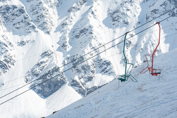 Cable car against the backdrop of the snow-capped Caucasus mountains, glacier seven
