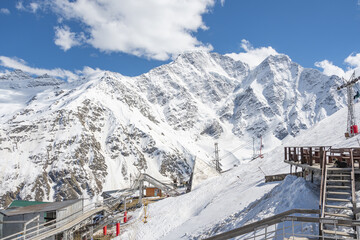Cable car against the backdrop of the snow-capped Caucasus mountains, glacier seven