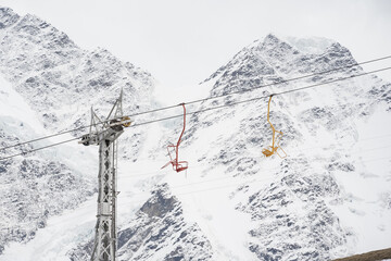 Cable car against the backdrop of the snow-capped Caucasus mountains, glacier seven