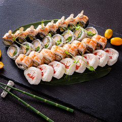 sushi on the black background