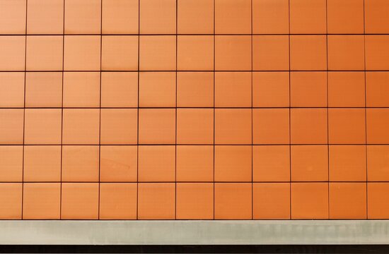 Modern ventilated facade made of terracotta tiles panels. Detail. Background and texture