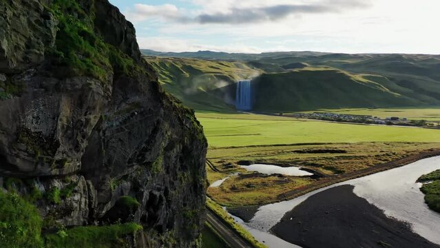 drone shot of a waterfall in iceland