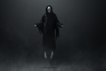 Fototapeta premium Grim reaper on dark background