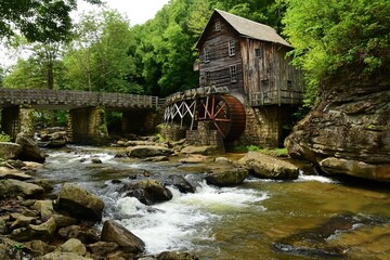 picturesque glade creek grist mill in summer on glade creek in babcock state park near fayetteville,  in the applalachian mountains of southern west virginia