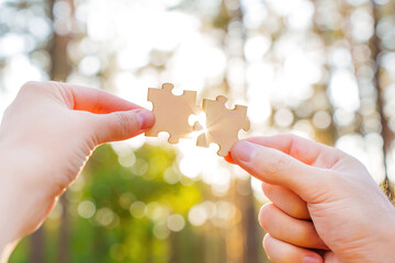 Connecting puzzle pieces against sun