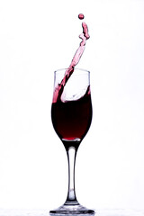 red wine pouring into glass