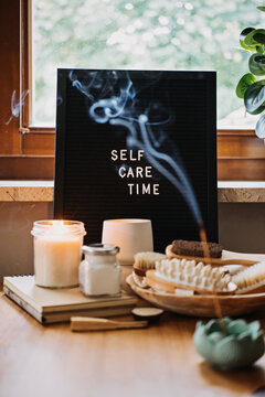 Self-care, Wellness concept. Letter board text Self Care Time, aroma sticks, body and self-care handmade cosmetics and natural organic beauty product