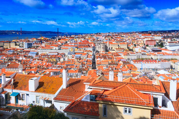 Fototapeta na wymiar Lisbon, Portugal City Skyline with bridge and the Tagus River