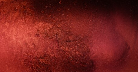 Glitter texture. Particles background. Flame sparks. Defocused luscious red color shiny sparkles on dark black abstract grain copy space banner.