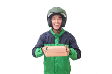 Portrait of Asian online courier driver wearing green jacket and helmet delivering package and box for customer. Isolated image on white background - obrazy, fototapety, plakaty