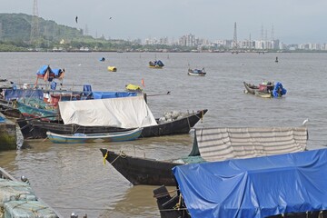 Naklejka premium Traditional wooden fishing boats in the port , mumbai, india