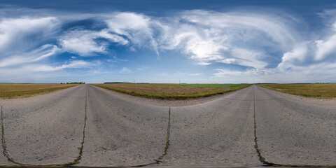 full seamless spherical hdri 360 panorama view on no traffic concrete road among fields with...
