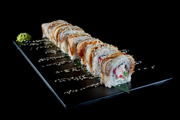 sushi on a black background