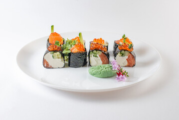 sushi rolls with avocado, salmon and vasabi