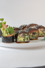 sushi rolls with avocado and salmon