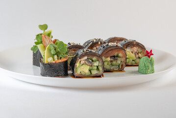 sushi rolls with avocado and salmon