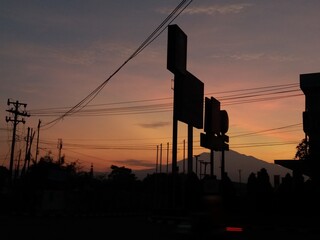 the sun rises in the middle of the city of Magelang, Central Java