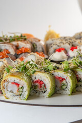 sushi rolls with salmon and wasabi