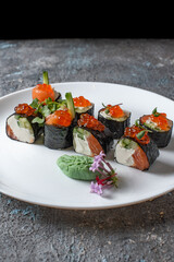 sushi rolls on white plate 