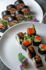 sushi rolls on white plate