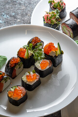 sushi rolls on white plate