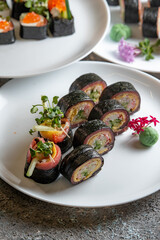 sushi rolls on white plate