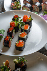 sushi rolls on white plate