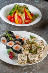 Lunch set. Sushi rolls and salad