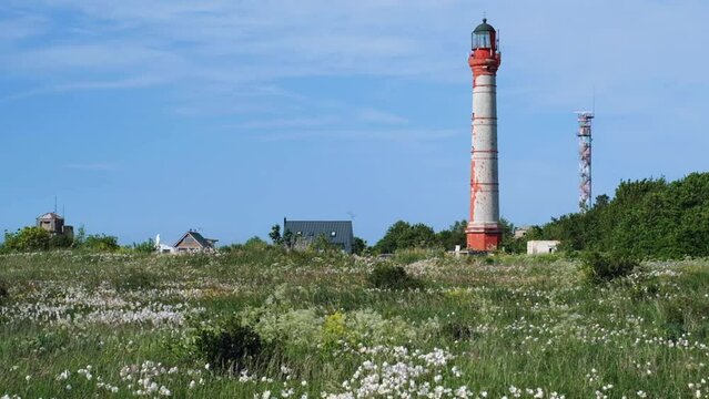 Beautiful lighthouse in a small village in clear weather