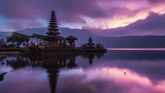 Ancient Pura Ulun Danu Bratan temple reflection with colorful sky at sunrise. Bali, Indonesia