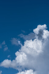 Obraz premium White clouds in the blue sky.