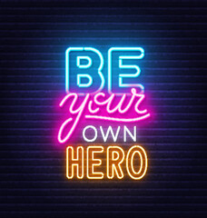 Fototapeta na wymiar Be Your Own Hero neon quote on brick wall background.