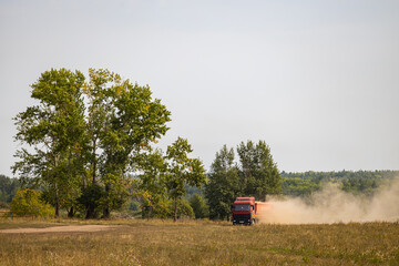 Fototapeta premium Ryazan Russia - August 31, 2022: truck driving on a country road