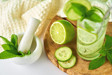 Cucumber, lime and mint lemonade. Refresment summer drink, Glass of detox water for dieting