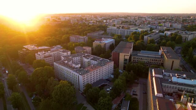 Krakow city skyline aerial sunrise view, Poland - pushback dolly 