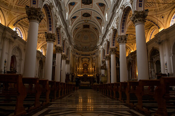 Obraz premium Internal naves of the basilica of San Pietro, a religious building in Modica, in the province of Ragusa, Italy. This church is considered a masterpiece of the Italian Baroque.