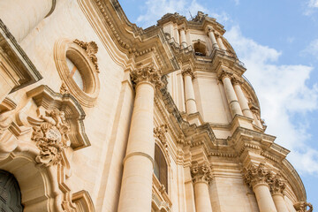 Closeup of the bell tower of the Duomo di San Giorgio, the mother church of the city of Modica in...